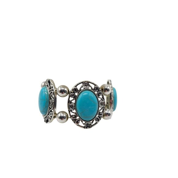 Faux Turquoise Silver Toned Stretch Bracelet With Floral Accents By Erica Lyons - Picture 1 of 5